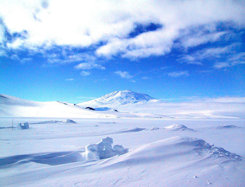 Mt. Erebus rises above the ice-covered Antarctica